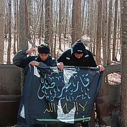 The Qarsherskiyan heritage flag features the Ajami Script, a West African writing system of scholarship, poetry, and faith